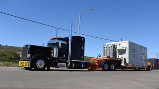 Inside a climate-controlled shipping container, the Sentinel-6B satellite arrived on a truck bed at Vandenberg Space Force Base in California on Aug. 18.