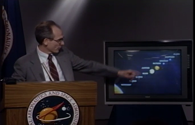 Ed Stone, the longtime project scientist of NASA's Voyager mission, cohosts a news conference on June 6, 1990, during which the mission revealed the 