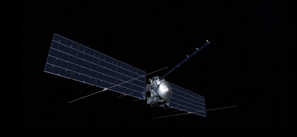 An artist's illustration of the Europa Clipper spacecraft in the vacuum of space. Large solar arrays extend horizontally, and multiple long, thin antennas are deployed from its main body against a starry background.