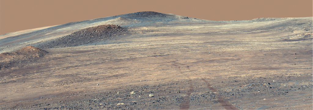 Description This view looking back up at the outside lip of the 490-foot-tall (150-meter-tall) rim of Jezero Crater was taken by the Mastcam-Z instrument aboard NASA’s Perseverance on May 15, 2025, the 1,505th day, or sol, of the rover’s mission to...