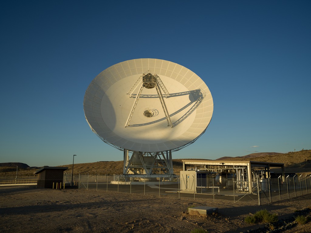 Description Long shadows are cast by the recently completed Deep Space Station 23 at the Deep Space Network’s Goldstone complex near Barstow, California, in August 2026. A 34-meter (114-foot) multifrequency beam-waveguide antenna, DSS-23 will boost...