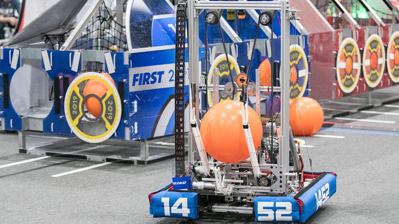 Illustrative FIRST Robotics Competition robot on a competition field