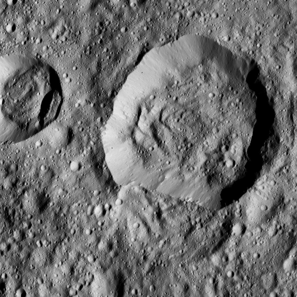 This view taken by NASA's Dawn spacecraft on June 17, 2016, features Liber Crater in Ceres' northern hemisphere, at right.