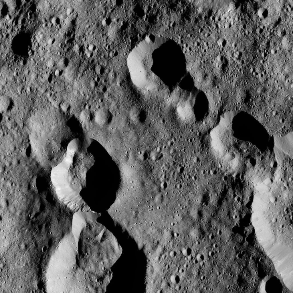 This view from NASA's Dawn spacecraft shows cratered terrain at 59 degrees north latitude, 89 degrees east longitude on Ceres, just east of the large crater named Omonga.